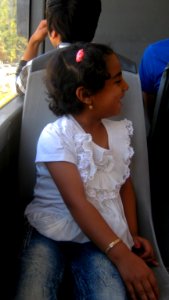 Happy girl sited on chair - morning - Nishapur 3