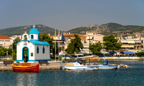 Harbour chapel, red boat, Nea Artaki, Evia Greece