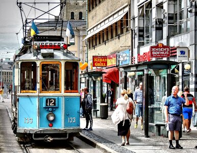 Hustle and bustle shopping street old tram photo