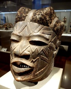 Helmet mask, Mozambique, Makonde people, early 20th century, wood, beeswax, hair - De Young Museum - DSC01108