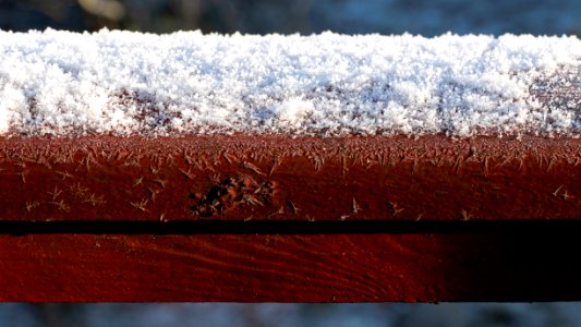 Heavy frost on a handrail photo
