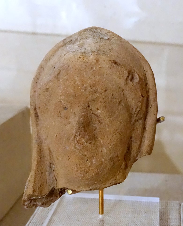 Head of female figurine, 1 of 2, Greek, Naukratis, modern Kom Gi'ef, Egypt, 525-480 BC, terracotta - Spurlock Museum, UIUC - DSC05742