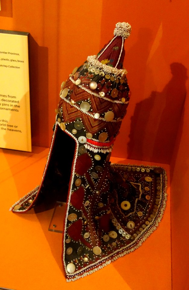 Headdress, Kohistan, Northwest Frontier Province, Pakistan, early 20th century, cotton, silk, silver, shell, plastic, glass, brass - Fernbank Museum of Natural History - DSC00080