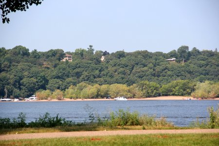 Houses along St. Croix River, seen from Hudson, WI Aug 2018
