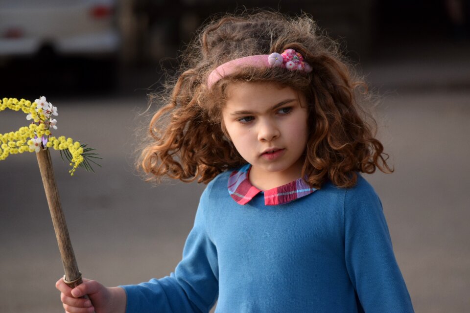 Girl holding stick portrait