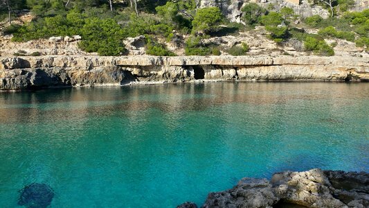 Turquoise sea rock