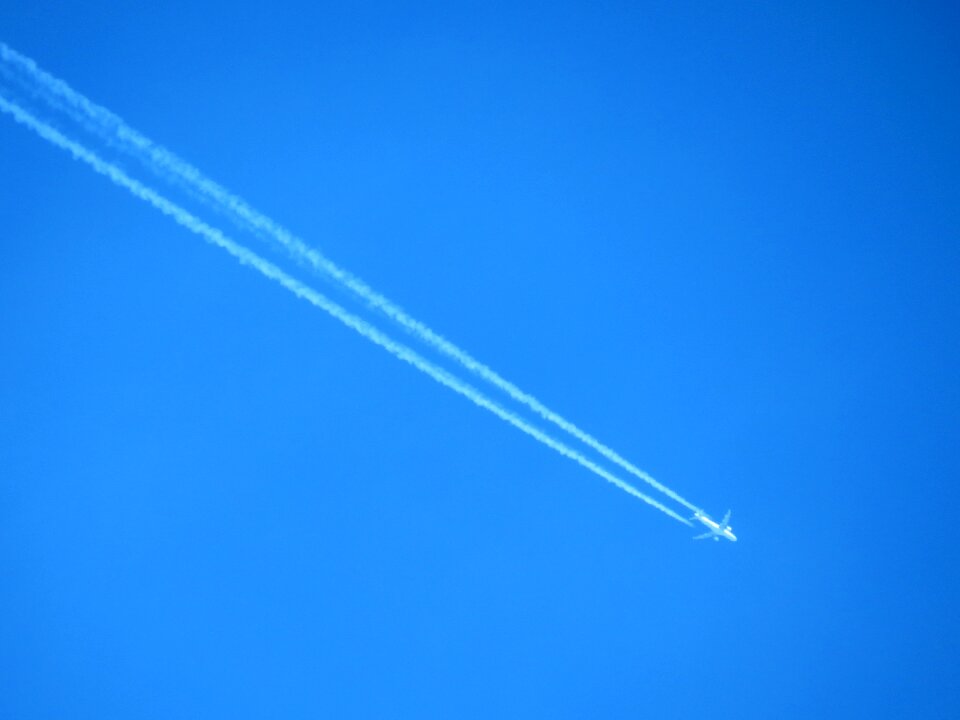 Aircraft contrail sky