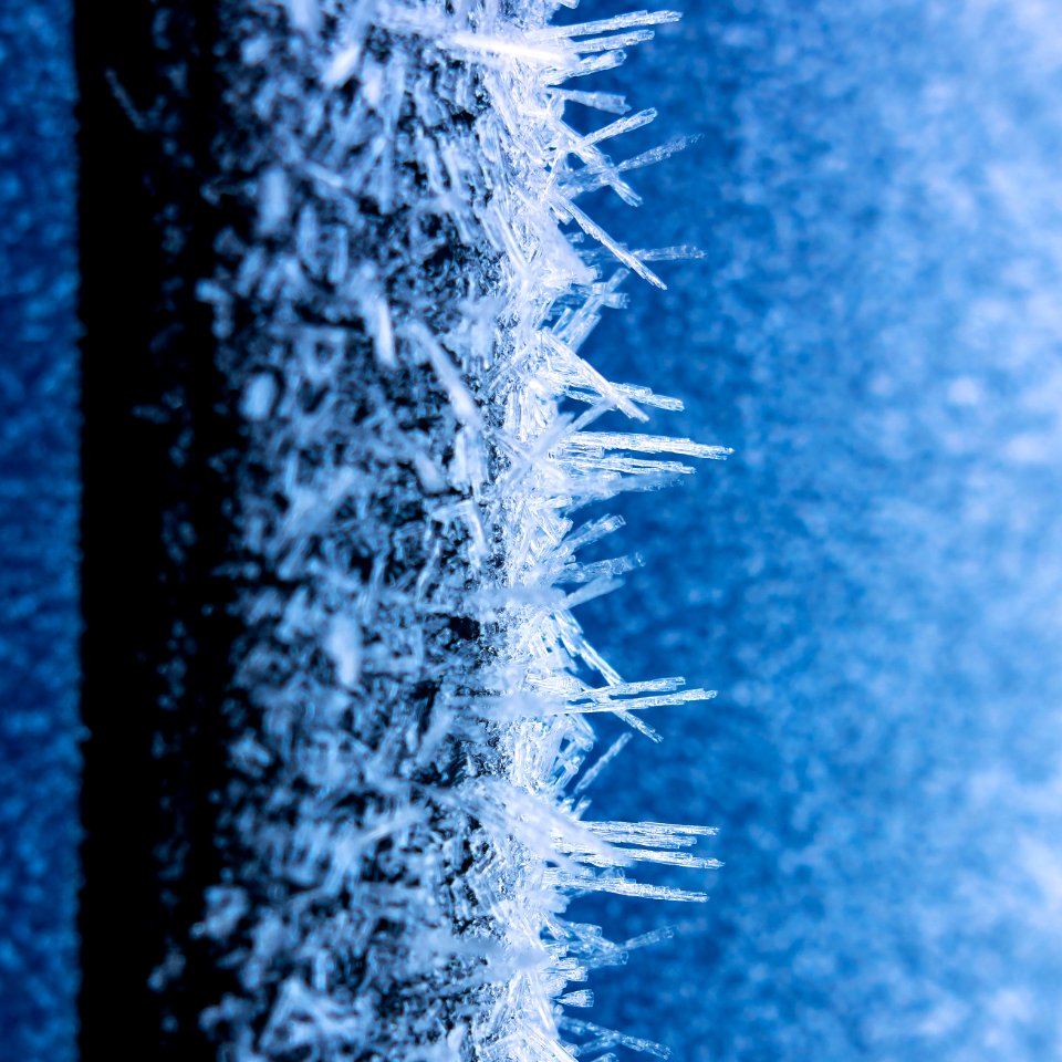 Hoar frost on a blue car 7 photo
