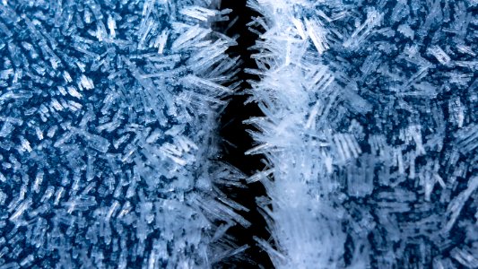 Hoar frost on a blue car 9 photo