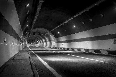 Black and white tunnel road photo