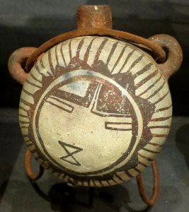 Hopi ceramic canteen decorated with face of Tawa, Heard Museum photo