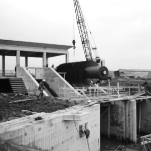 Inpoldering en bemaling, gemalen, vijzels, arbeiders, 'de munte', Bestanddeelnr 159-1077