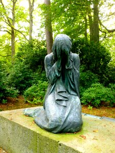 Statue figure mourning