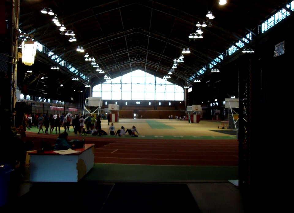 Indoor track and gymnasium and students at Cornell University