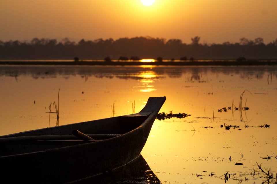Silhouette reflection brown boat