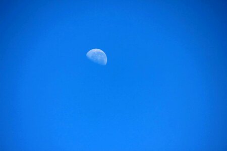 Half moon blue sky