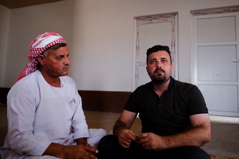 Interviewing Ezidi truck drivers waiting for work at a house near Hardan village in Sinjar region 22