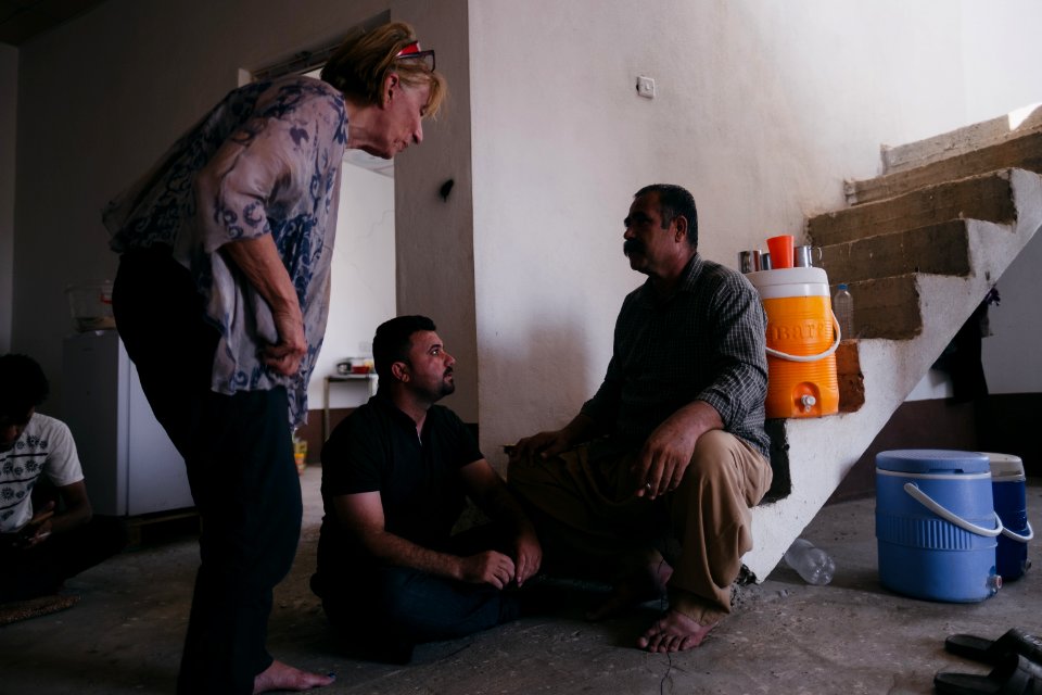 Interviewing Ezidi truck drivers waiting for work at a house near Hardan village in Sinjar region 17