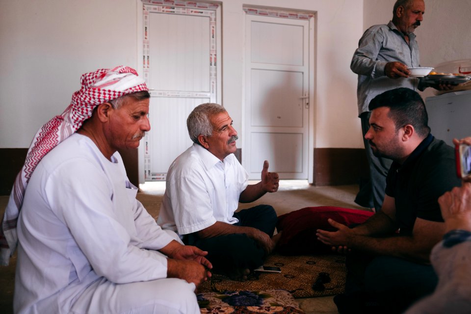 Interviewing Ezidi truck drivers waiting for work at a house near Hardan village in Sinjar region18