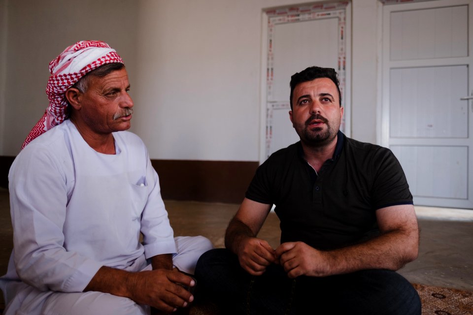 Interviewing Ezidi truck drivers waiting for work at a house near Hardan village in Sinjar region 23