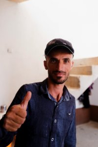 Interviewing Ezidi truck drivers waiting for work at a house near Hardan village in Sinjar region 38