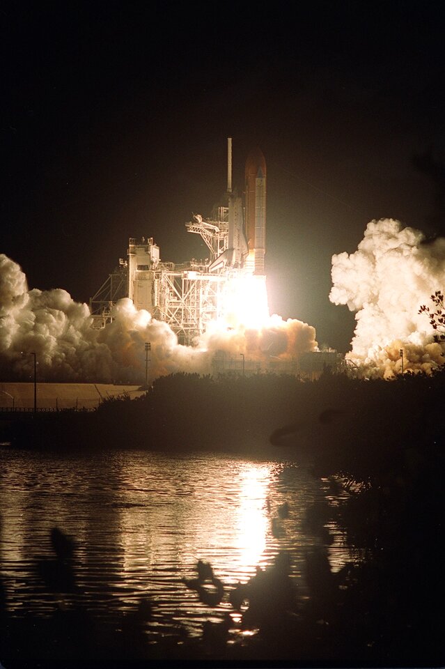 Astronauts liftoff rockets