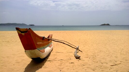Boat marble beach sea