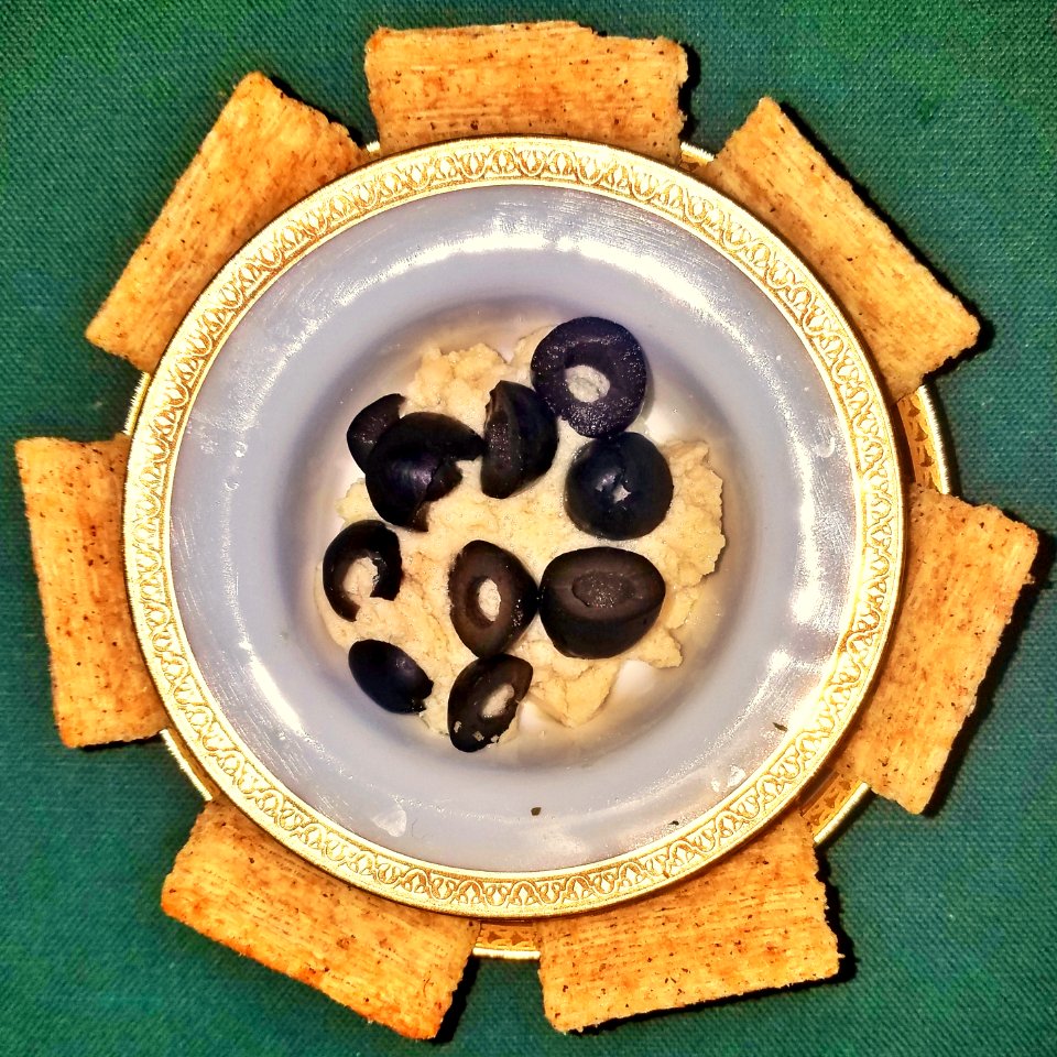Hummus with black olives and Triscuits - Massachusetts