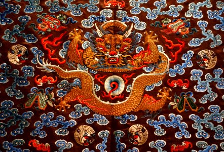 Imperial court robe with nine dragons, detail, China, Qing dynasty, 1800s AD, silk and gold-wrapped thread embroidery on brown silk - Portland Art Museum - Portland, Oregon - DSC08472