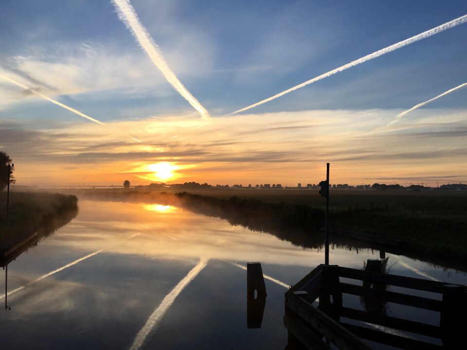 Swing bridge sky mirroring