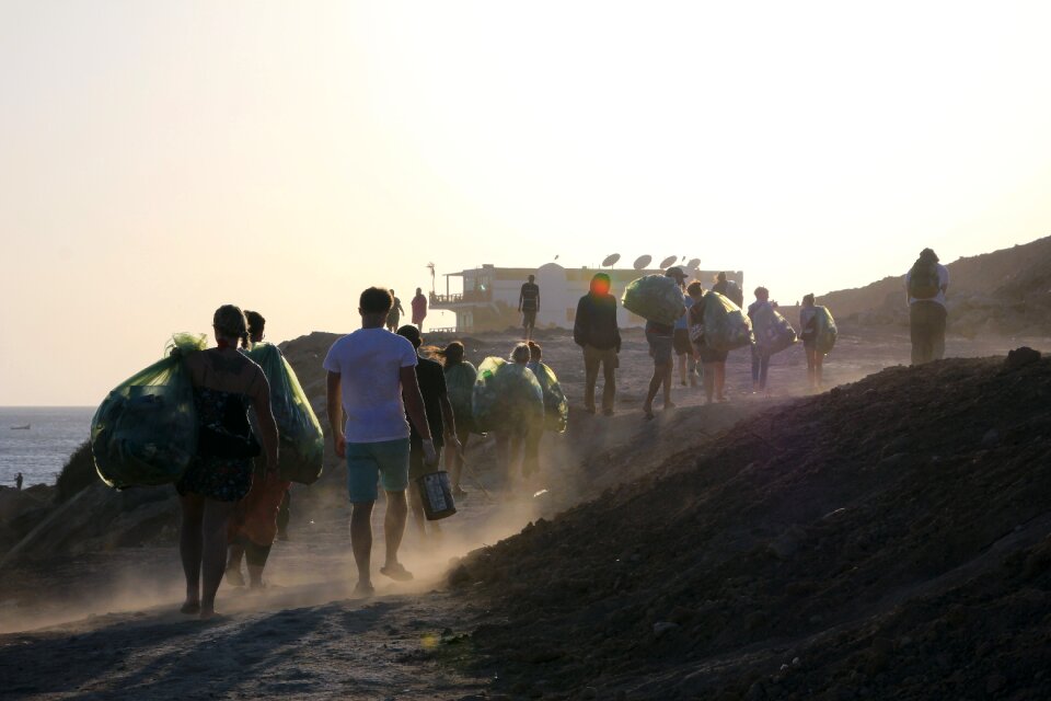Collect garbage bags carry away