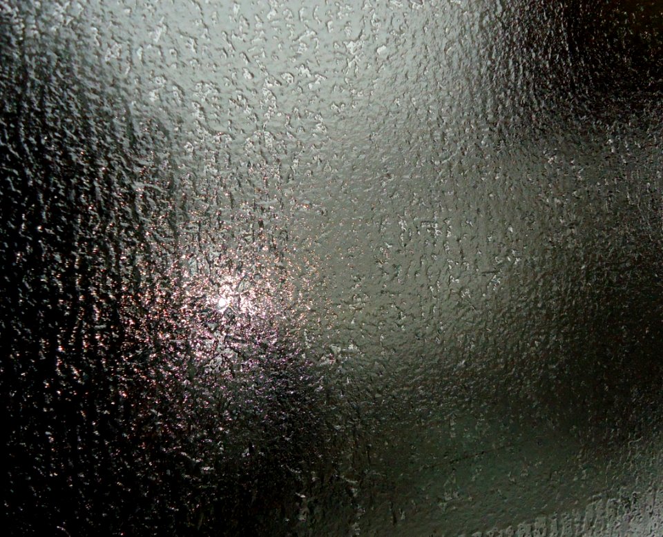 Ice on rear window of minivan
