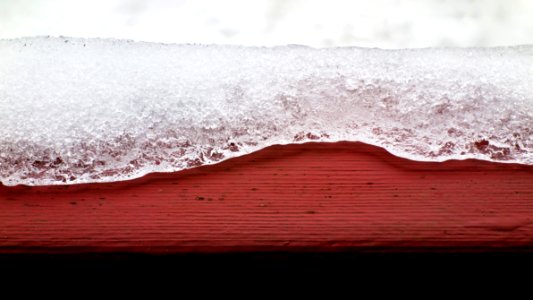 Ice on red balcony