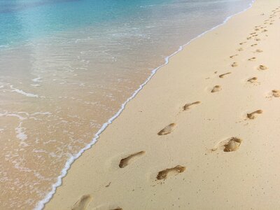 Footstep beach sand print photo