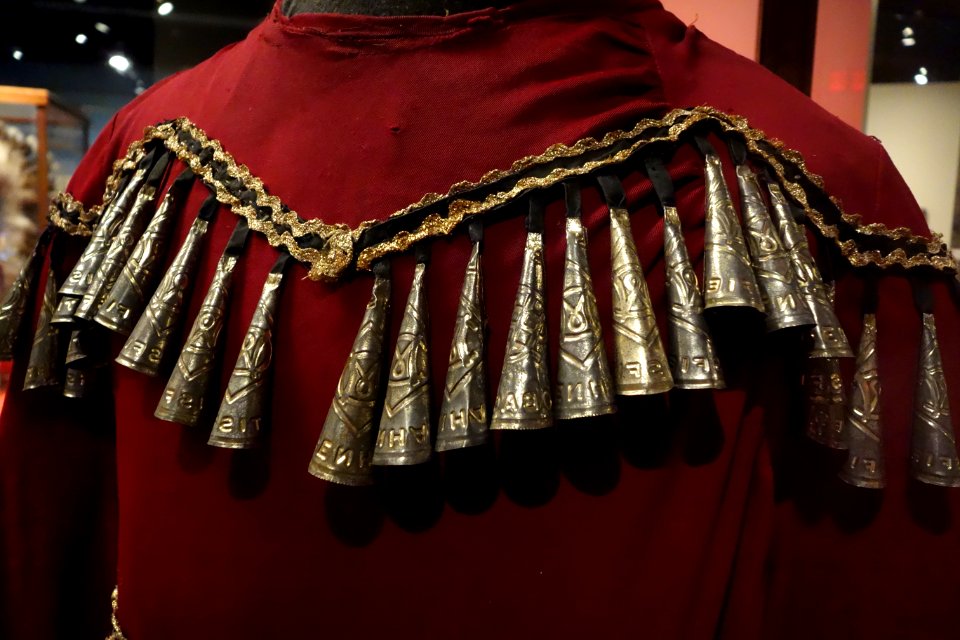 Jingle Dance Dress, Day Star First Nation, mid 1900s, view 2, cloth, metal - Glenbow Museum - DSC00868