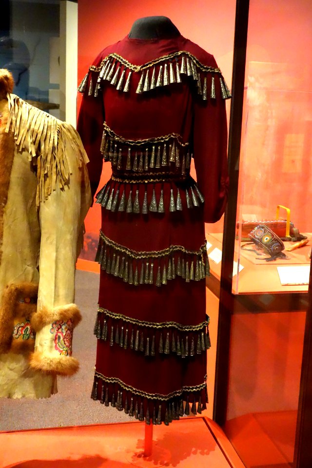 Jingle Dance Dress, Day Star First Nation, mid 1900s, view 1, cloth, metal - Glenbow Museum - DSC00864