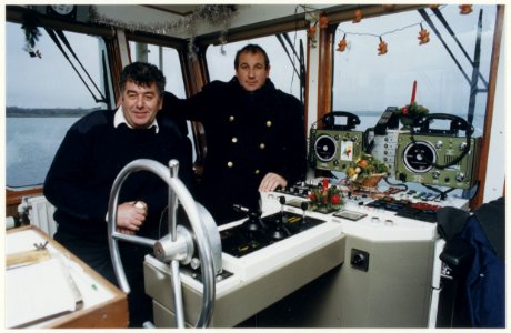 John Huismans en (r) Ton Bussen op de pont over het Noordzeekanaal. NL-HlmNHA 54050179 photo