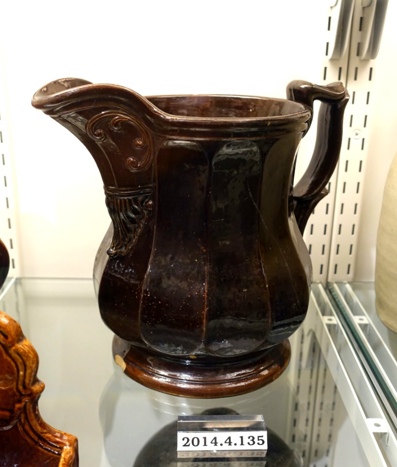 Jug by John T. Winslow, Portland, Maine, 1850-1860, stoneware, Albany slip glaze, item HD 2014.4.135 - Flynt Center of Early New England Life - Deerfield, Massachusetts - DSC04171