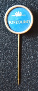 Jorzolino, blauw reclame speldje