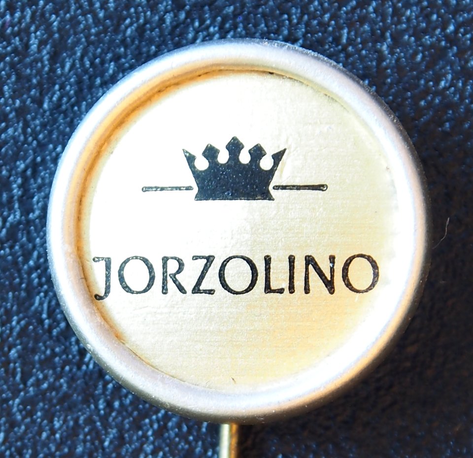Jorzolino, lichtroze reclame speldje