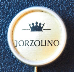 Jorzolino, lichtroze reclame speldje