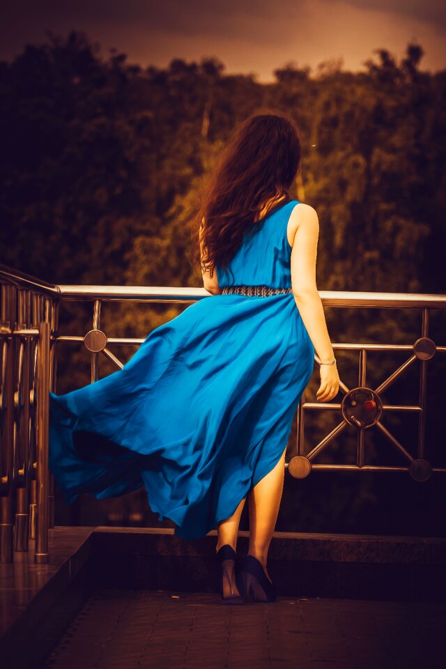 Length of dress dark background hair
