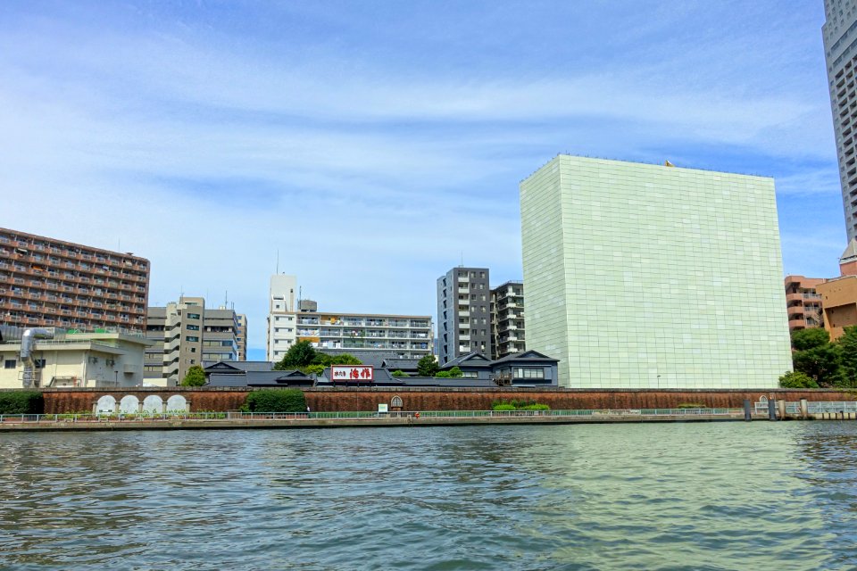 Iwasaki mansion, Tsukiji, and building under construction, from the Sumida River - Tokyo, Japan - DSC06281