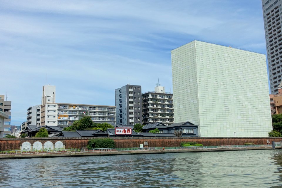 Iwasaki mansion, Tsukiji, and building under construction, from the Sumida River - Tokyo, Japan - DSC06279