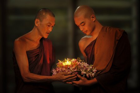 Candle in dark buddhism theravada photo