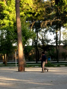 Iranian Man and his wife walking and talking - Mohammad Al Mahruq Mosque - Nishapur 2