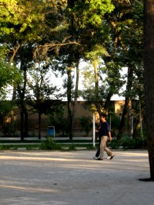 Iranian Man and his wife walking and talking - Mohammad Al Mahruq Mosque - Nishapur 4