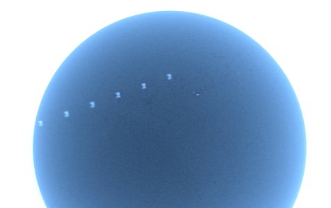 ISS crosses the Sun Inverted photo