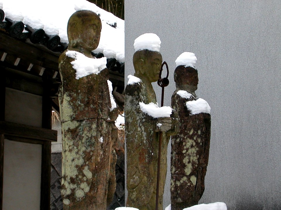 Japanese nature statues in snow