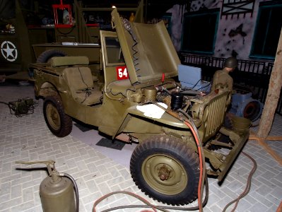 Jeep under repairs in makeshift base-camp